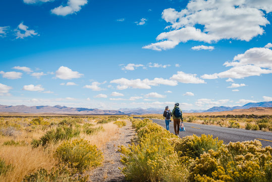 Couple Backpacking in Desert