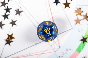 Astrology Dice with symbol of Ketu on Natal Chart Background