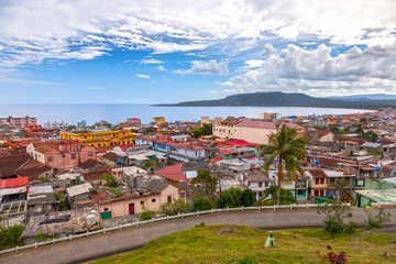 Scenic Landscape View of Residential Houses and Bahia De Miel Atlantic Ocean Coastline in City of Baracoa Cuba