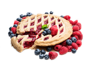 Homemade whole forest fruit tart isolated on white