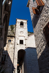 Narrow old streets of Kotor, Montenegro. Stony church