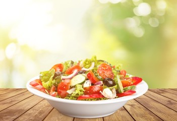 Photo of fresh salad with vegetables