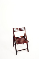 wooden chair on a white background. garden folding chair made of wood.