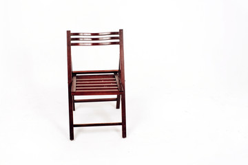 wooden chair on a white background. garden folding chair made of wood.