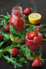 Detox drink with strawberries and arugula. Summer drink in the heat. Fitness drink.