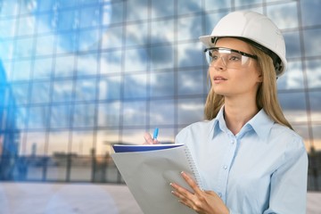 Beautiful woman engineer  with document