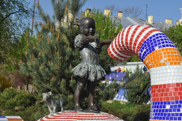 Kiev Ukraine 2019: the figure of a girl with a dog on a fountain with an elephant in the Landscape...