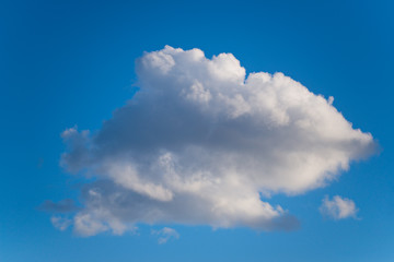 A lonely cloud in the blue sky.
