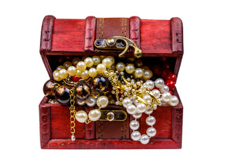 Vintage treasure chest full of jewelry and accessories isolated on white background