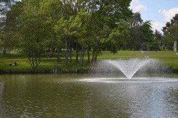 Lake in park with fountain