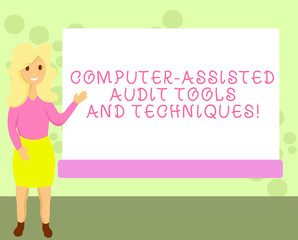Conceptual hand writing showing Computer Assisted Audit Tools And Techniques. Business photo showcasing Modern auditing applications Female Hu analysis Presenting Rectangular Blank Whiteboard