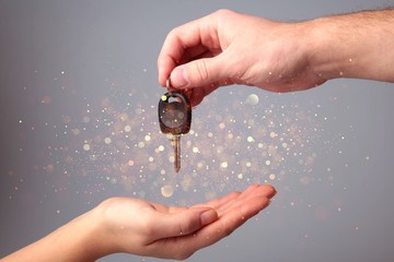Key car key human hands designated driver concept car rental holding