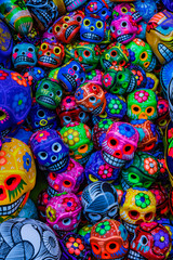 Fototapeta na wymiar Colorful Mexican Ceramic Skulls Day Dead Handicraft Oaxacas Juarez Mexico