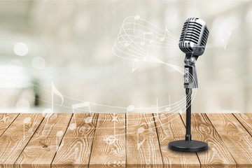Retro style microphone on  background