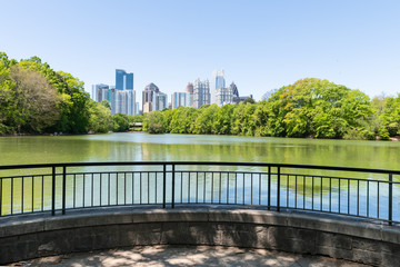 Atlanta, USA Cityscape skyline view in Piedmont Park in Georgia downtown green trees urban city...