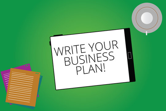 Writing note showing Write Your Business Plan. Business photo showcasing Establish steps to accomplish company goals Tablet Screen Cup Saucer and Filler Sheets on Color Background