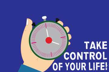 Writing note showing Take Control Of Your Life. Business photo showcasing Be the analysisager of your destiny motivation Hu analysis Hand Holding Stop Watch Timer with Start Stop Button