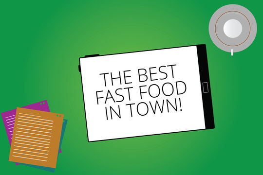 Writing note showing The Best Fast Food In Town. Business photo showcasing Tasty good junk dishes burgers and fries Tablet Screen Cup Saucer and Filler Sheets on Color Background