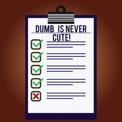 Word writing text Dumb Is Never Cute. Business concept for To be stupid ignorant is never an attractive feature Lined Color Vertical Clipboard with Check Box photo Blank Copy Space