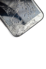 Close up of broken screen smart phone isolated on white