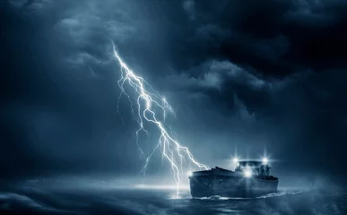 Fototapeten Boat in the thunderstorm in the ocean © releon8211