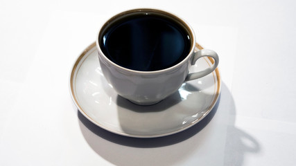cup and saucer with coffee 2