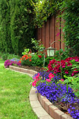 Landscaped yard with flower bed 