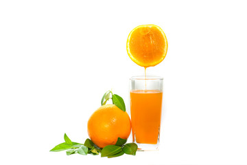 glass of fresh orange juice with fresh fruits isolated on white background.