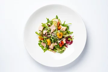 Foto auf Glas salad with tuna on the white plate © Maksim Shebeko