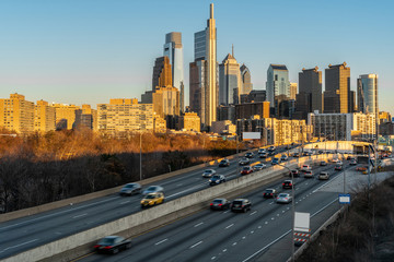 Philadelphia Pennsylvania cityscape with Expressway in rush hour at the evening time, United States, Business Architecture and Transportation concept