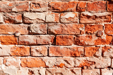 brick wall with metal nails
