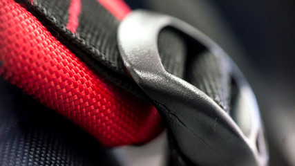Open band strap of a bag in close up view.