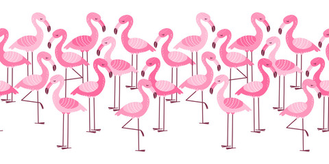 Seamless border with cartoon pink flamingos isolated on white