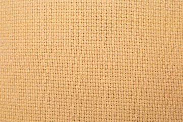 Abstract closeup yellow fabric texture background, blank yellow fabric pattern background