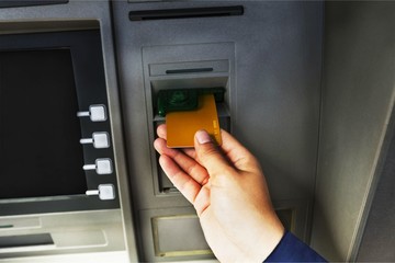 Atm bank banking paper currency bank teller removing currency