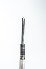 a set of mini screwdrivers isolated against white background