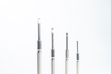 a set of mini screwdrivers isolated against white background