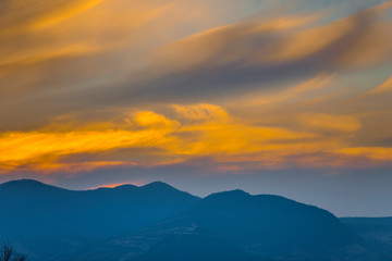 Obraz premium Clouds at the sunset