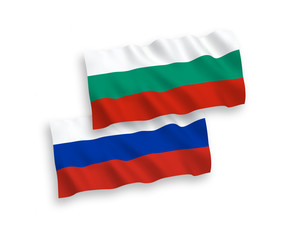 National vector fabric wave flags of Bulgaria and Russia isolated on white background. 1 to 2 proportion.