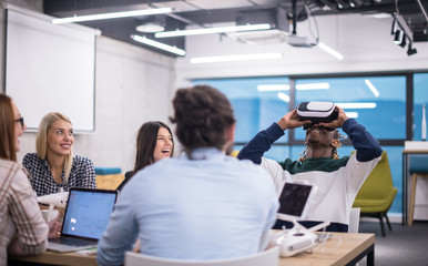 Young Multiethnic Business team using virtual reality headset