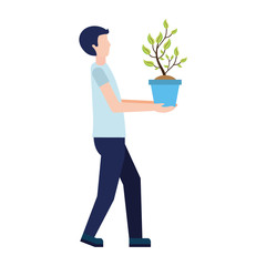 man holding plant in pot