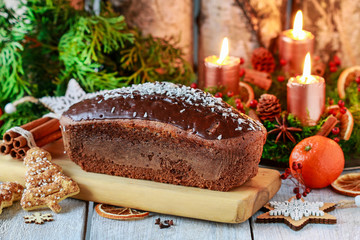 Christmas gingerbread cake among traditional decorations.