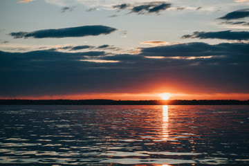 Sunset over the Seawater with Beautiful clouds