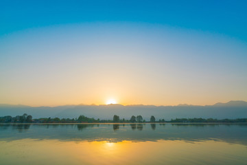 Sunrise on Dal lake, Kashmir India .