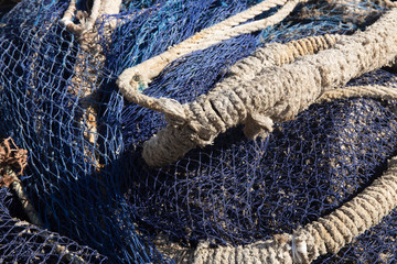 Tangled fishing nets and ropes wharfside in Essaouira, Morocco