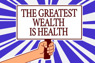 Text sign showing The Greatest Wealth Is Health. Conceptual photo being in good health is the prize Take care Man hand holding poster important protest message blue rays background