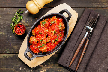 Meatballs with rise in tomato sauce