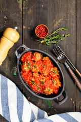 Meatballs with rise in tomato sauce