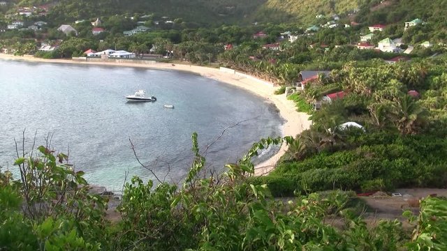Anse de Lorient Bay on Saint Barth&eacute;lemy Island in the Caribbean with Green Mountains, Blue Sea and Sandy Beach
