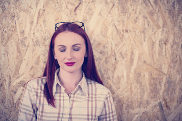 portrait of young redhead business woman